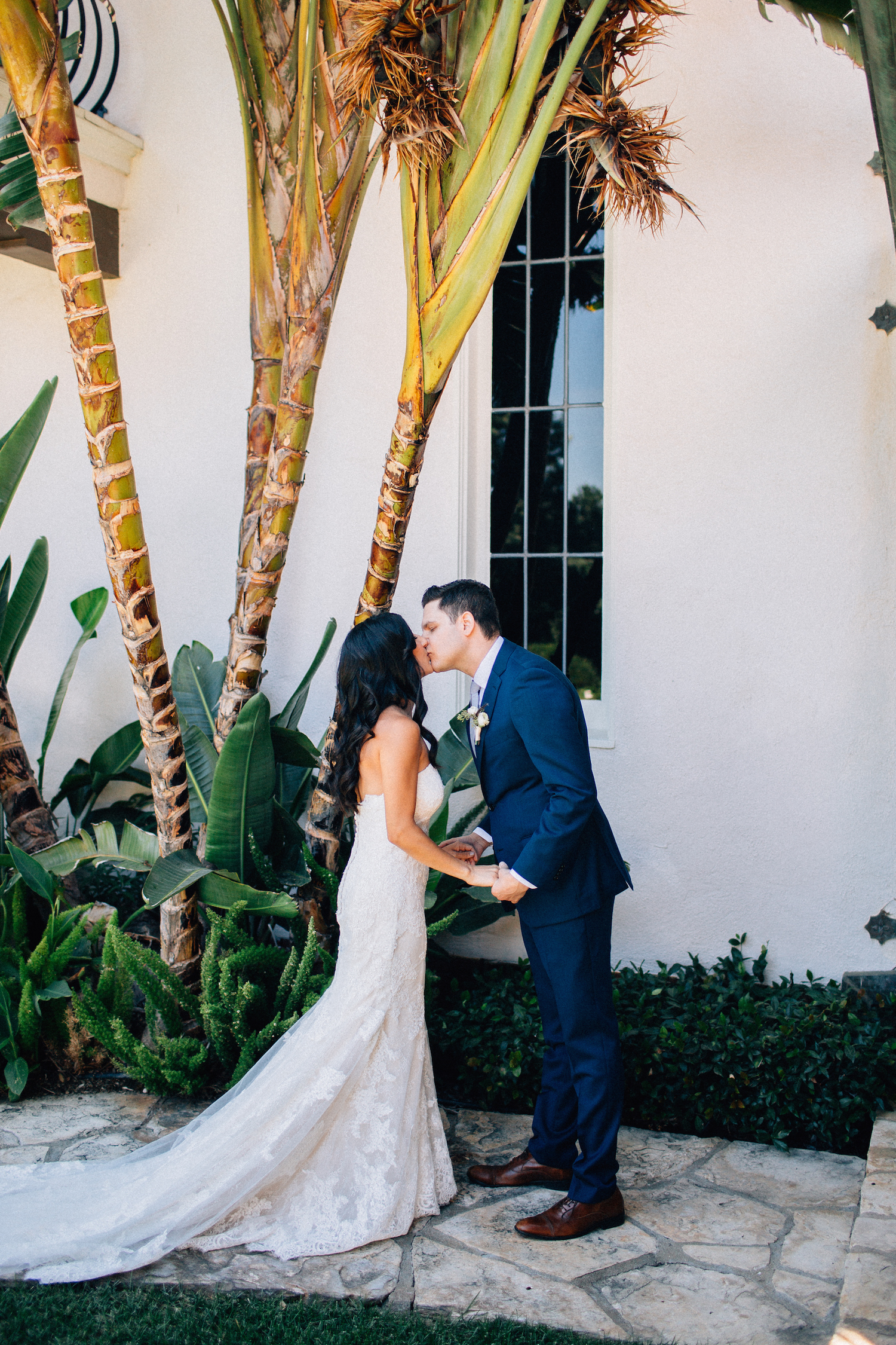 bride and groom kiss
