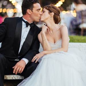 bride and groom kiss